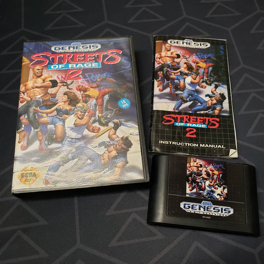 Image shows the case, manual & cartridge for the video game Streets of Rage 2 for Sega Genesis