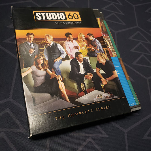 Image shows the case & three fanned-out disc cases for the complete series set of Studio 60 on the Sunset Strip on DVD