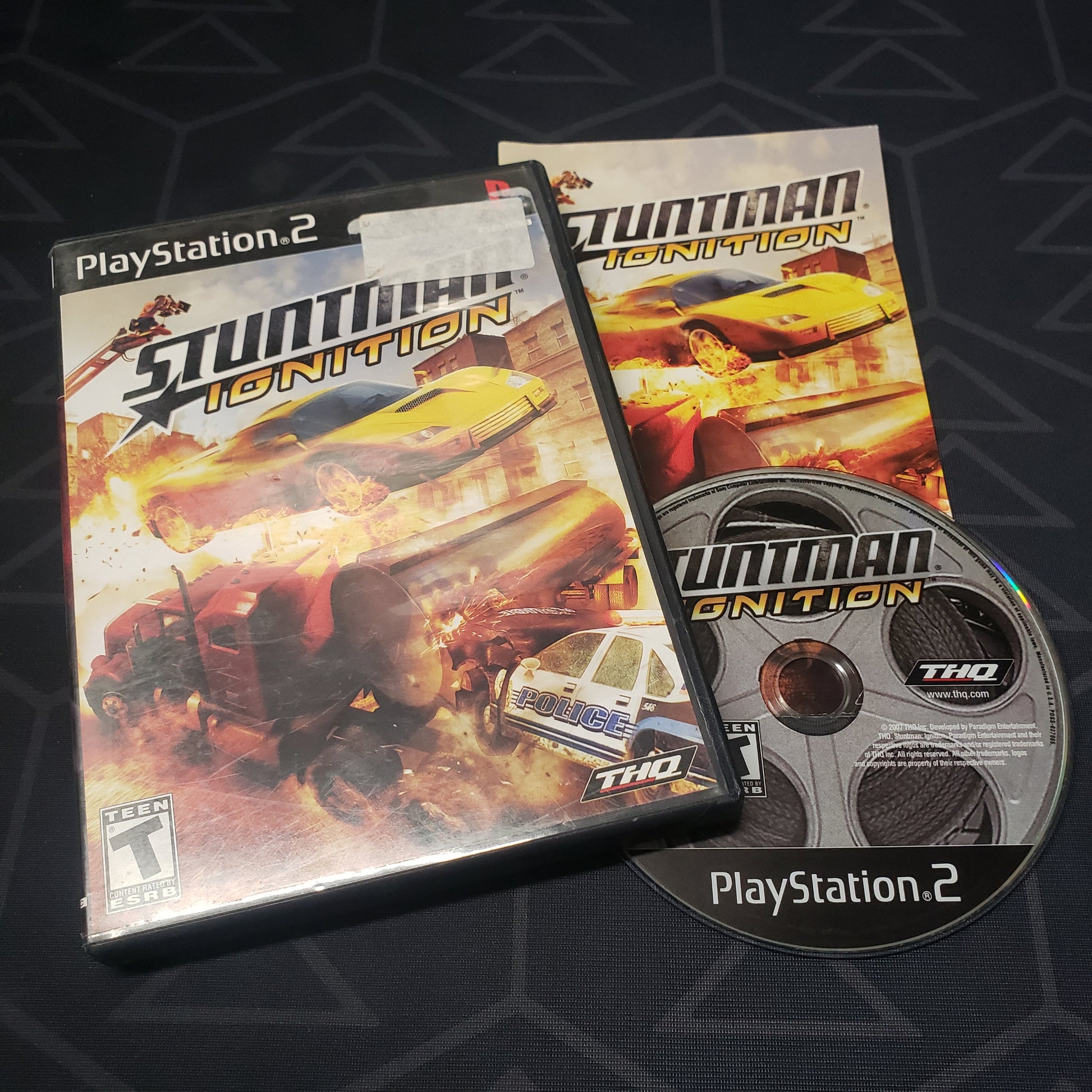 Image shows the case, manual and disc for the video game Stuntman: Ignition for Playstation 2