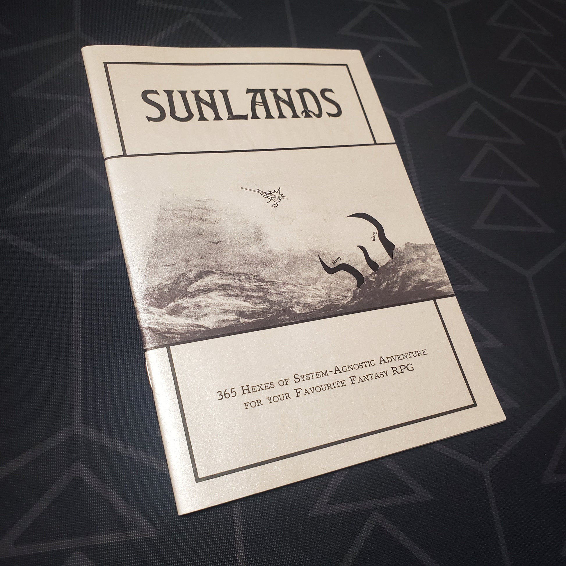 Image shows the front cover of the Sunlands roleplaying game book