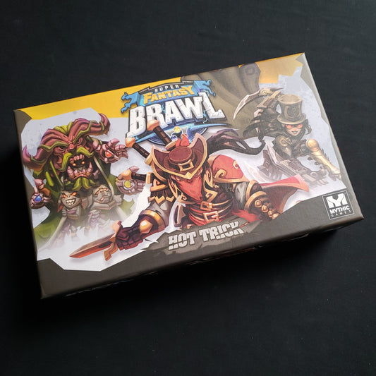 Image shows the front of the box for the Hot Trick Expansion for the Super Fantasy Brawl board game