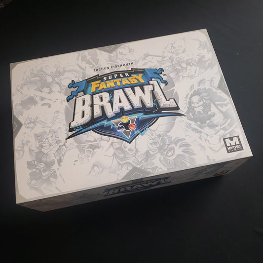 Image shows the front cover of the Superfan Kickstarter box for the board game Super Fantasy Brawl