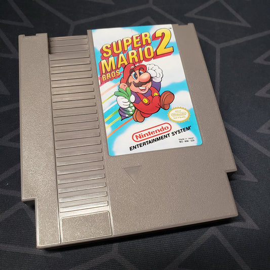 Image shows the front of the cartridge for the video game Super Mario Bros. 2 for the Nintendo Entertainment System