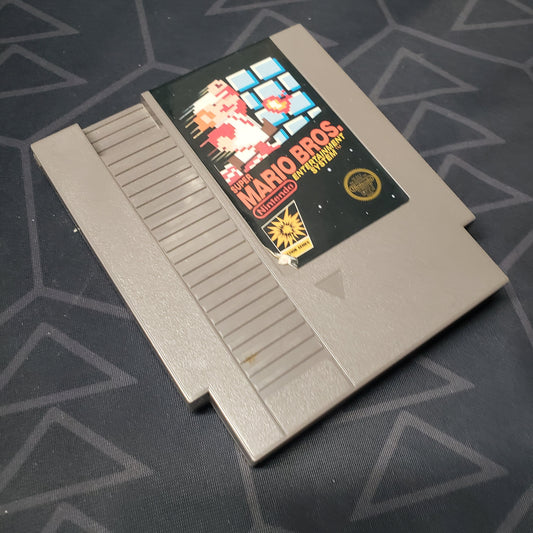 Image shows the front of the cartridge for the video game Super Mario Bros. for the Nintendo Entertainment System