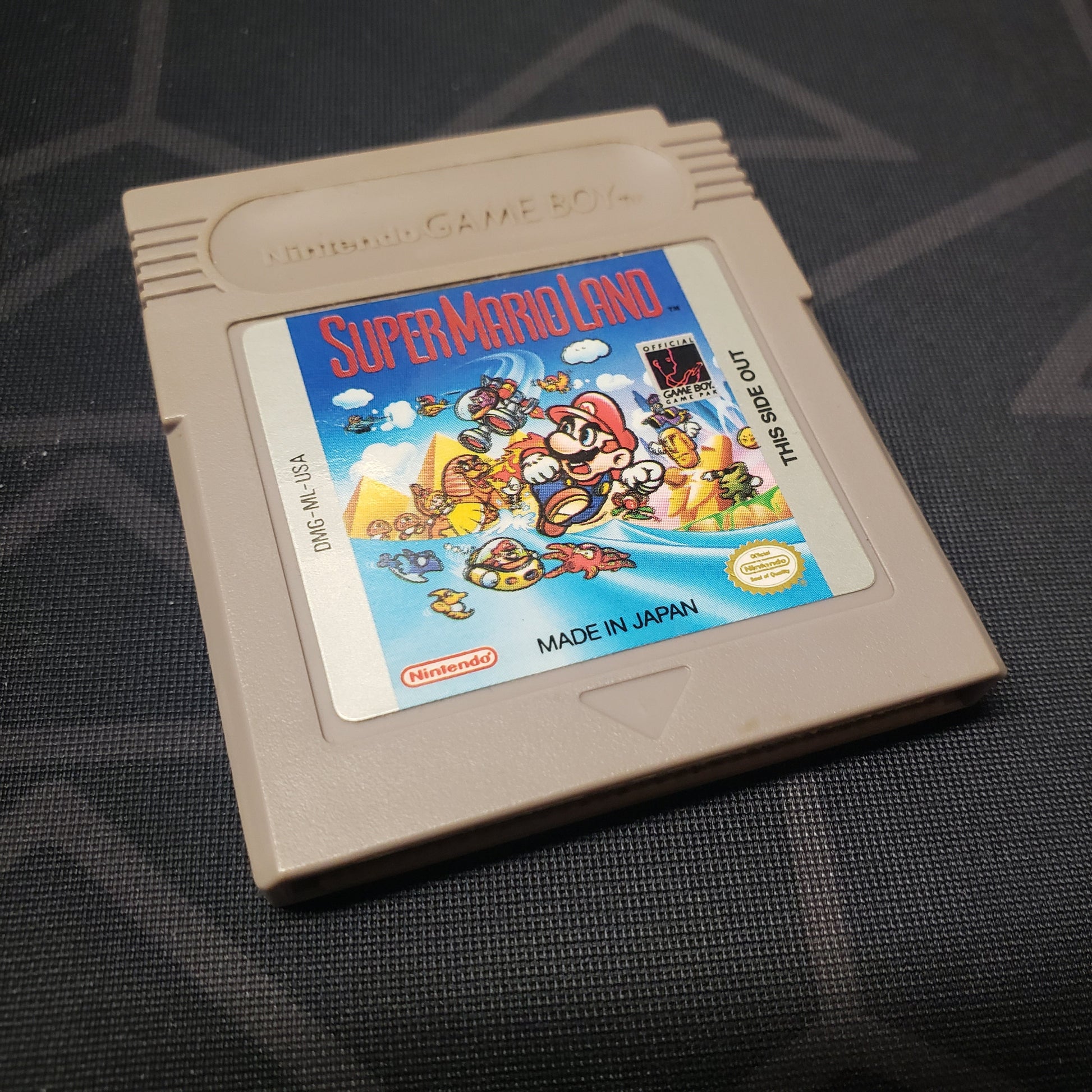 Image shows the front of the cartridge for the video game Super Mario Land for Nintendo Game Boy