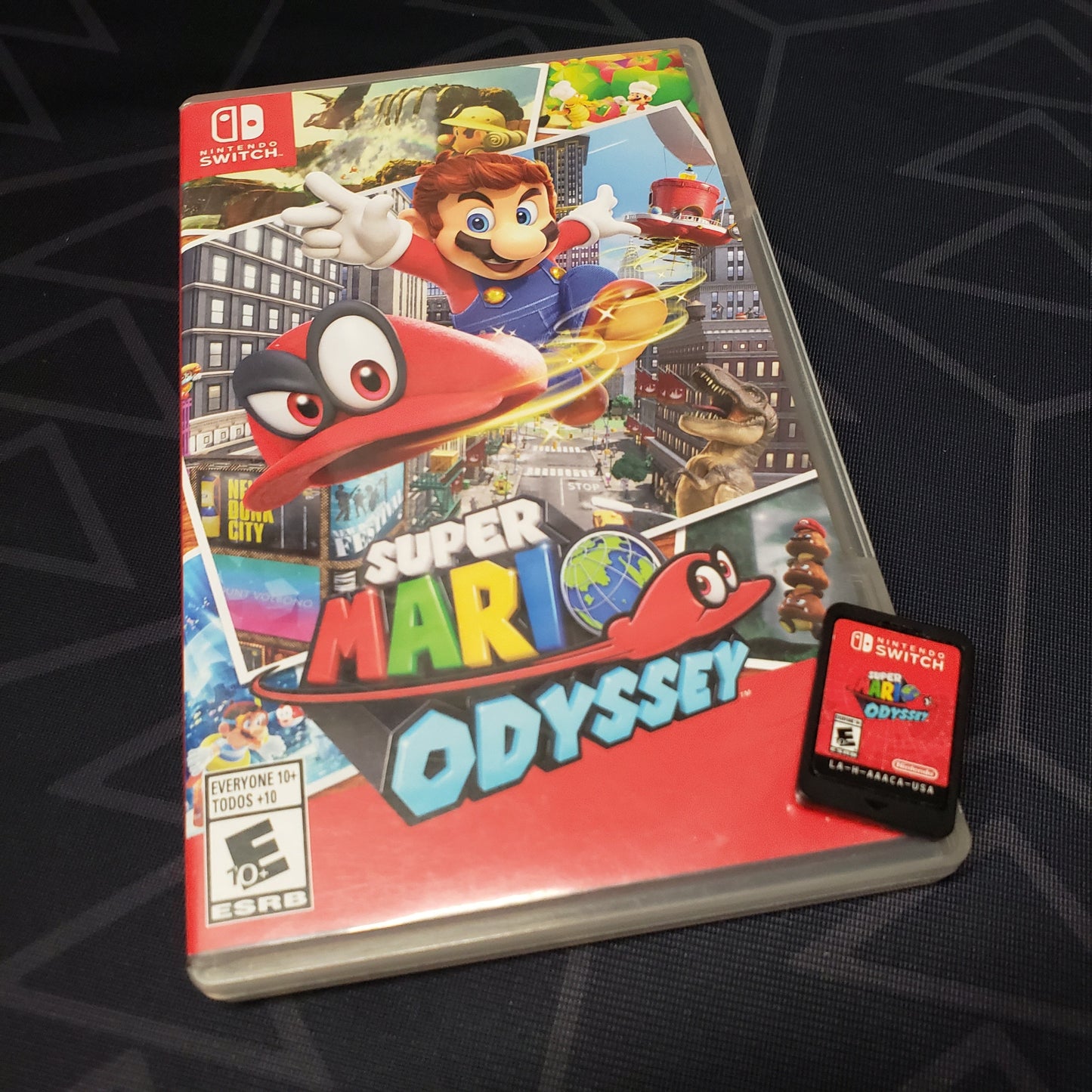 Image shows the case & cartridge for the game Super Mario Odyssey for Nintendo Switch