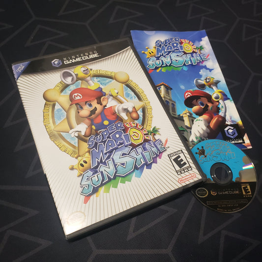 Image shows the case, manual and disc for the video game Super Mario Sunshine for Nintendo GameCube