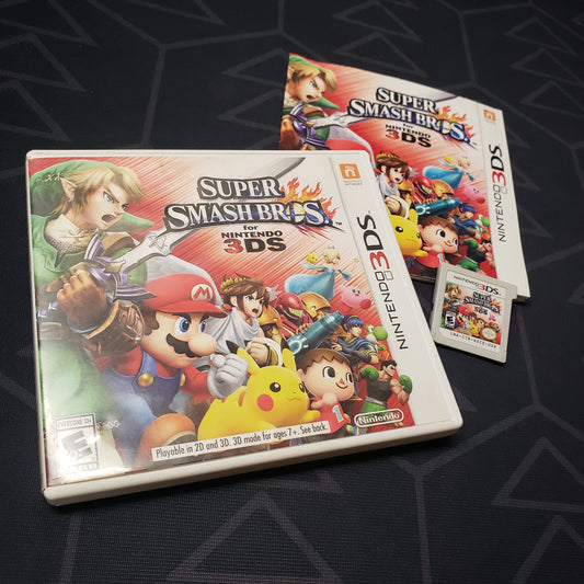 Image shows the case, manual and cartridge for the video game Super Smash Bros for Nintendo 3DS