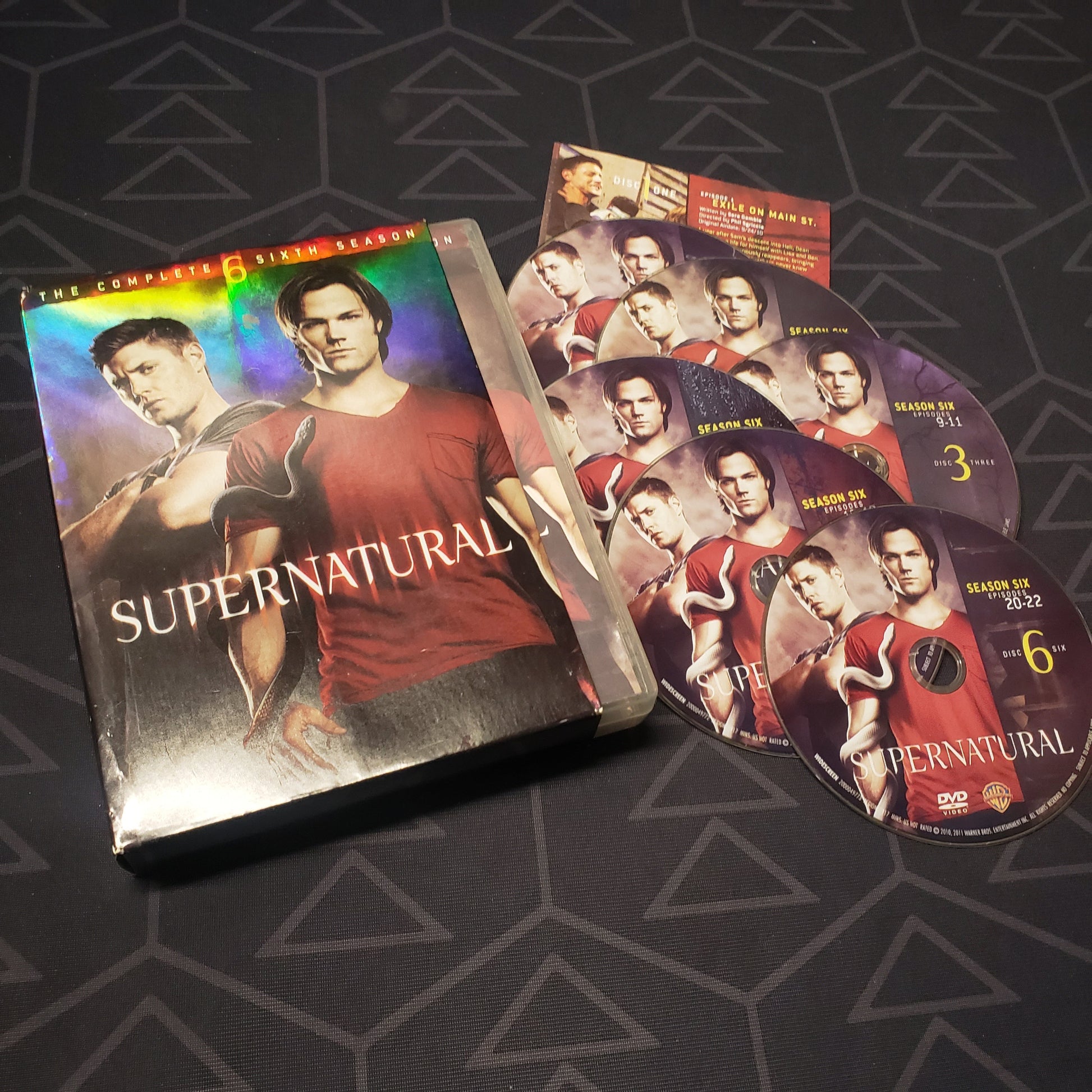 Image shows the case, insert & six discs for the sixth season of Supernatural on DVD