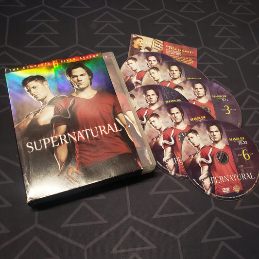 Image shows the case, insert & six discs for the sixth season of Supernatural on DVD