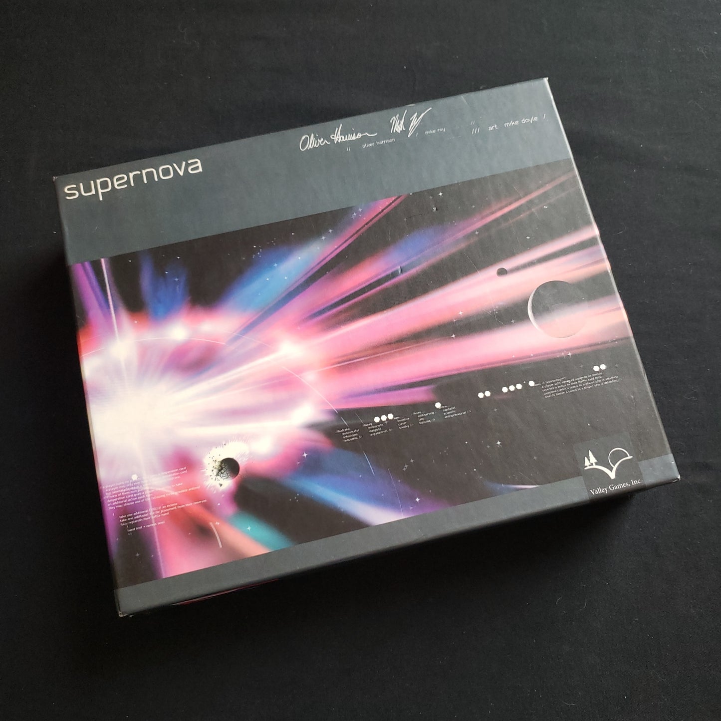 Image shows the front cover of the box of the Supernova board game