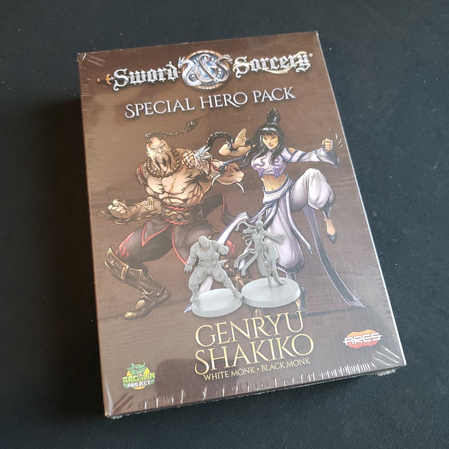 Image shows the front cover of the box of the Genryu / Shakiko Hero Pack for the board game Sword & Sorcery: Ancient Chronicles