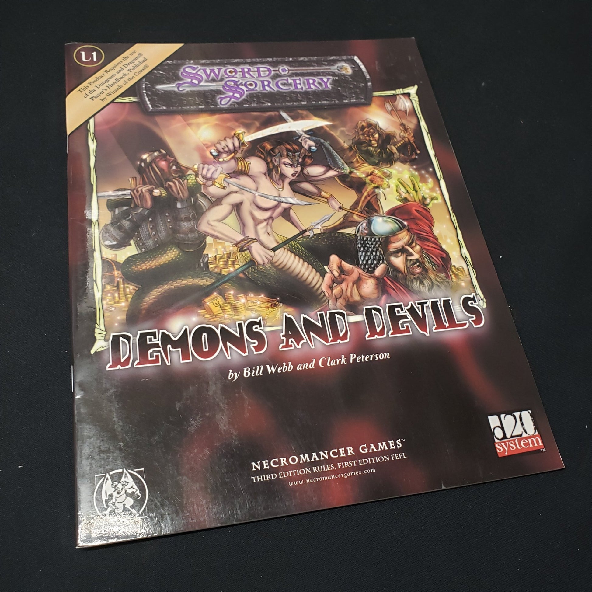 Image shows the front cover of the Sword & Sorcery: Demons & Devils roleplaying game book