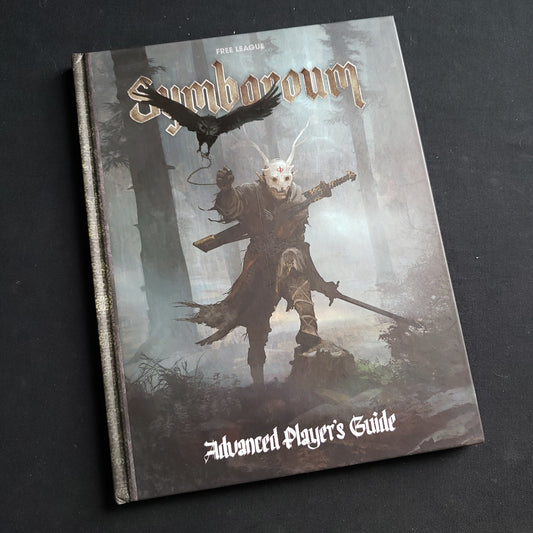 Image shows the front cover of the Advanced Player's Guide book for the Symbaroum roleplaying game