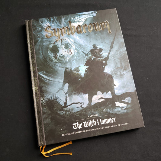 Image shows the front cover of the Karvosti: The Witch Hammer book for the Symbaroum roleplaying game