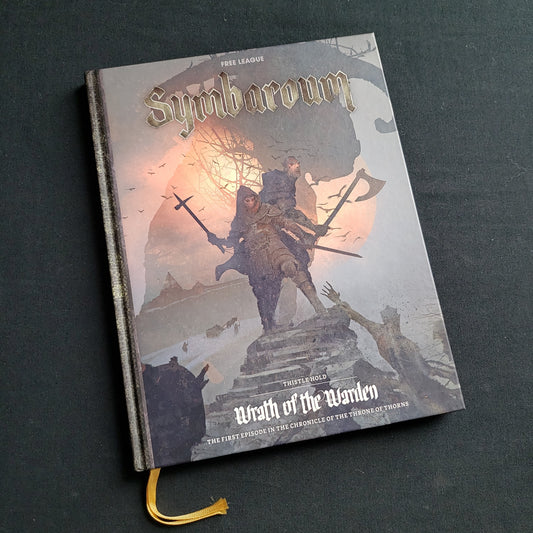 Image shows the front cover of the Thistle Hold: Wrath of the Warden book for the Symbaroum roleplaying game