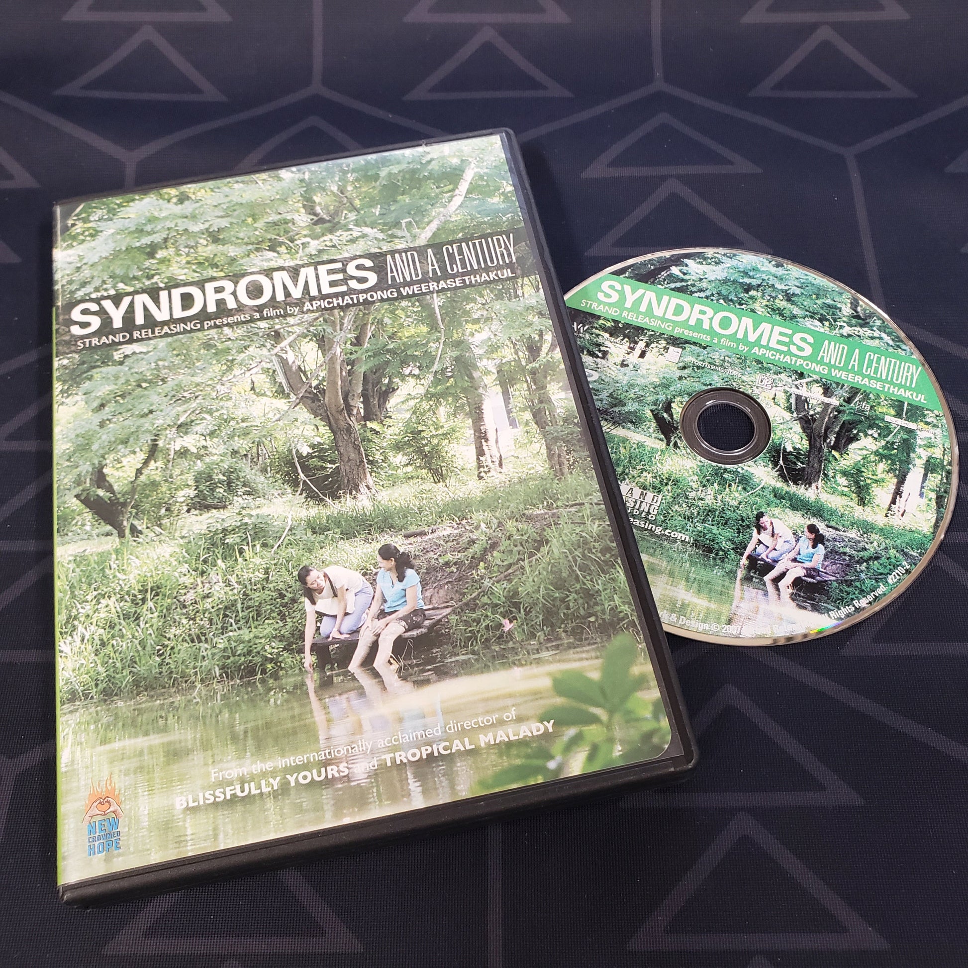 Image shows the case & disc for the documentary film Syndromes and a Century on DVD