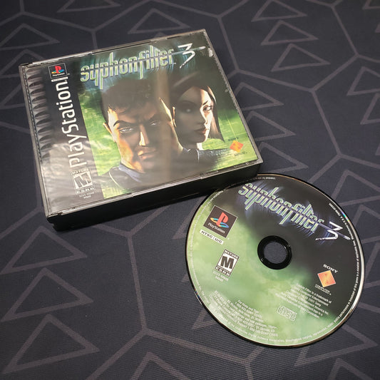 Image shows the front of the jewel case and disc for the video game Syphon Filter 3 for Playstation 1