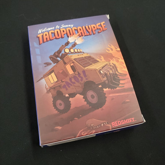 Image shows the front cover of the box of the Tacopocalypse card game