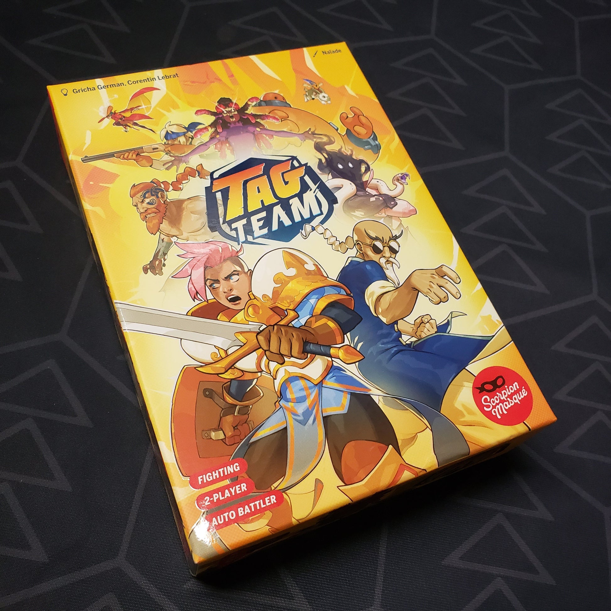 Image shows the front cover of the box for the Tag Team card game