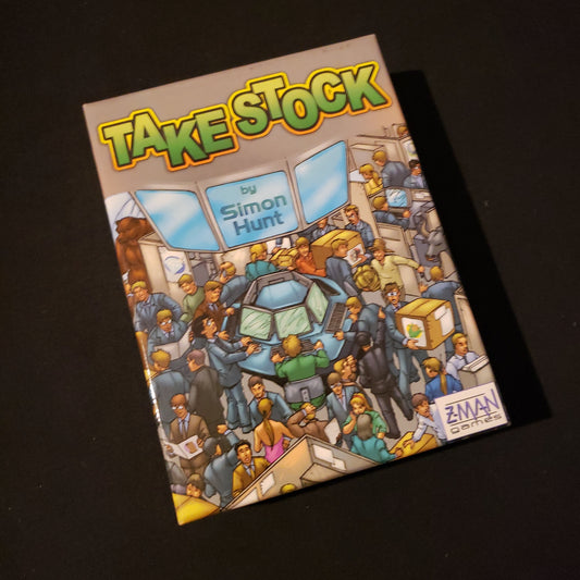 Image shows the front cover of the box of the Take Stock card game