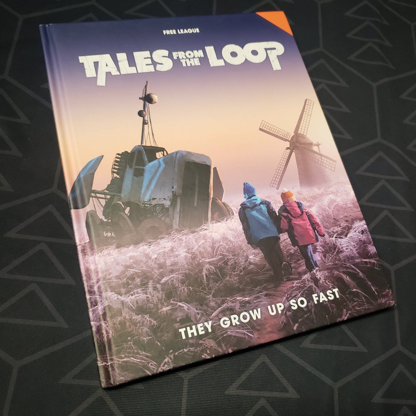 Image shows the front cover of the They Grow Up So Fast book for the roleplaying game Tales From the Loop