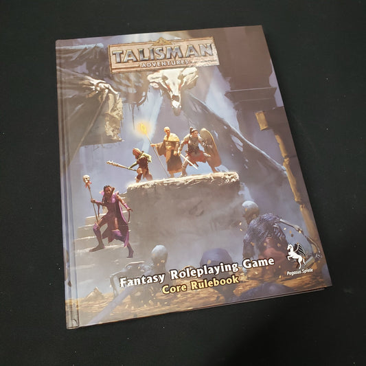 Image shows the front cover of the core rulebook for the roleplaying game Talisman Adventures