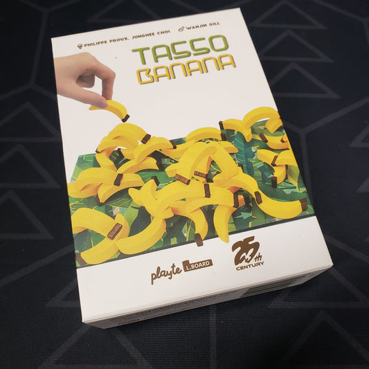 Image shows the front cover of the box of the Tasso Banana board game