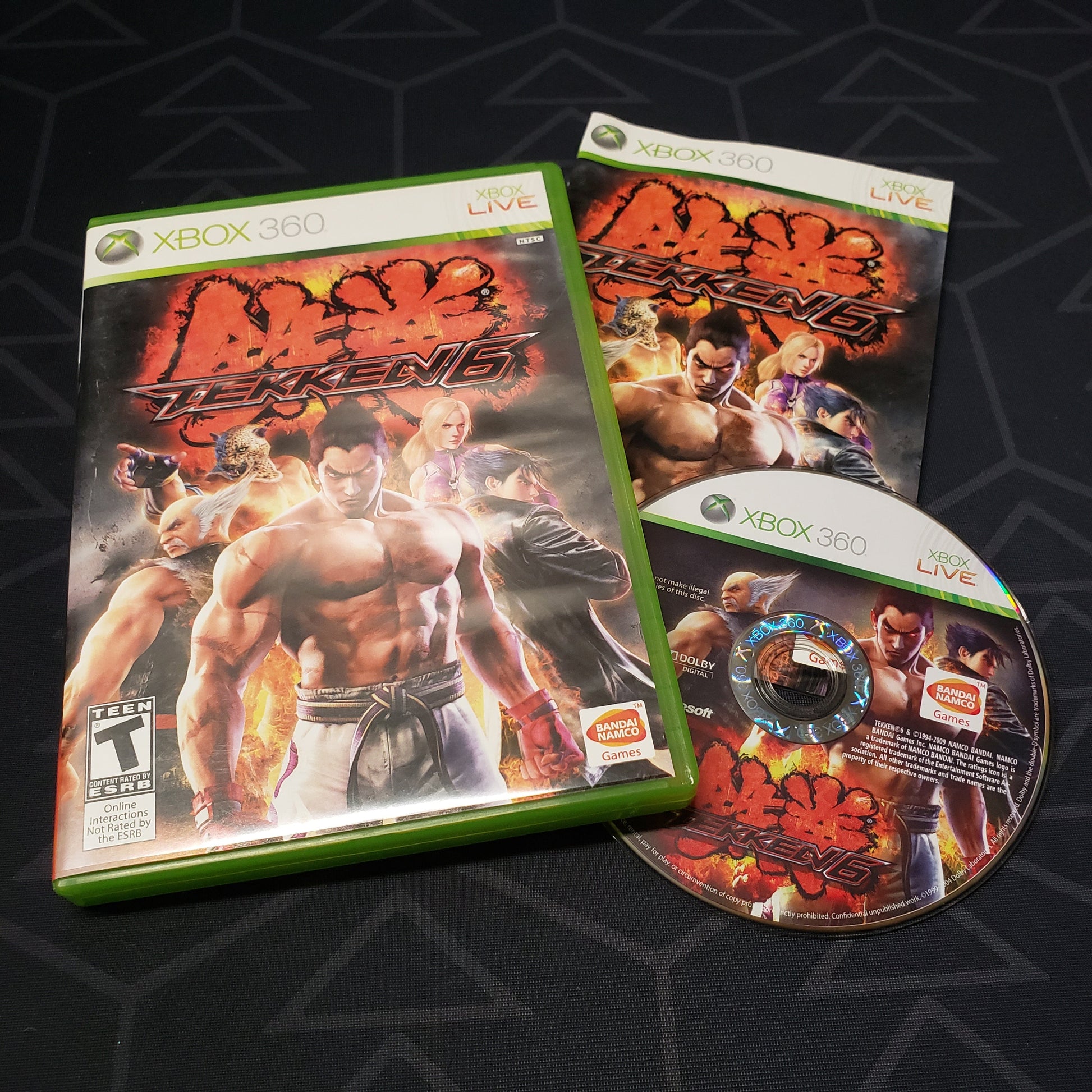 Image shows the case, manual and disc for the video game Tekken 6 for Xbox 360