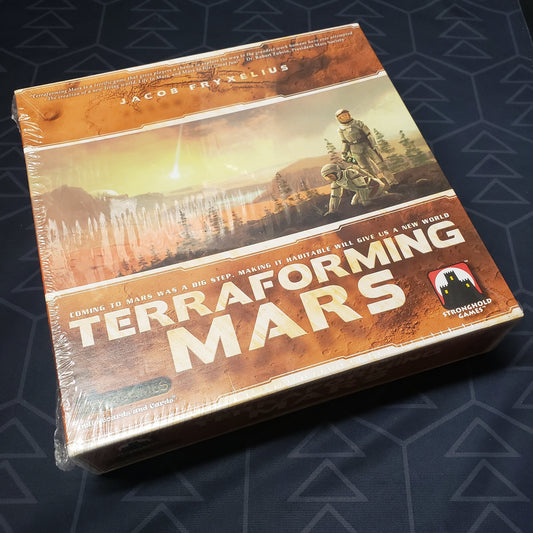 Image shows the front cover of the box of the Terraforming Mars board game