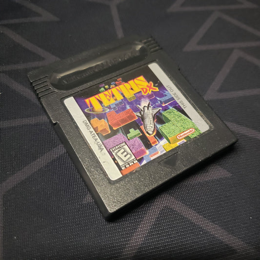 Image shows the front of the cartridge for the video game Tetris DX for Nintendo Game Boy Color