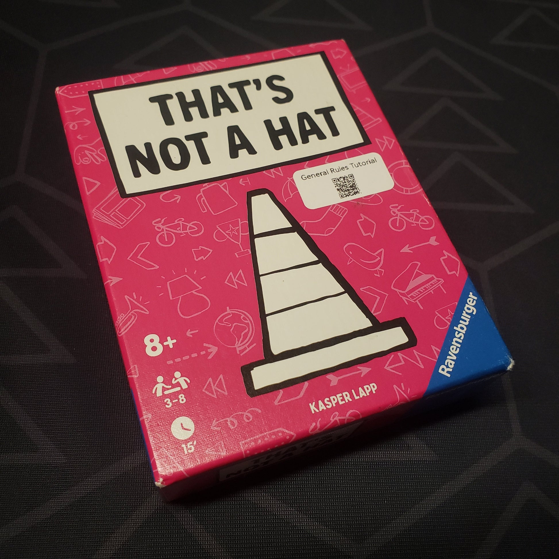 Image shows the front cover of the box for the card game That's Not a Hat