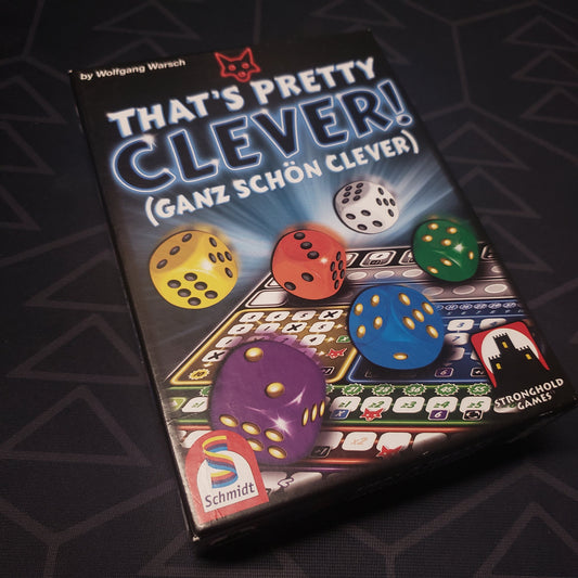 Image shows the front cover of the box of the That's Pretty Clever dice game
