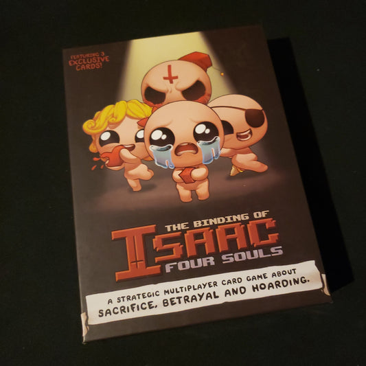 Image shows the front cover of the box of the Binding of Isaac: Four Souls card game