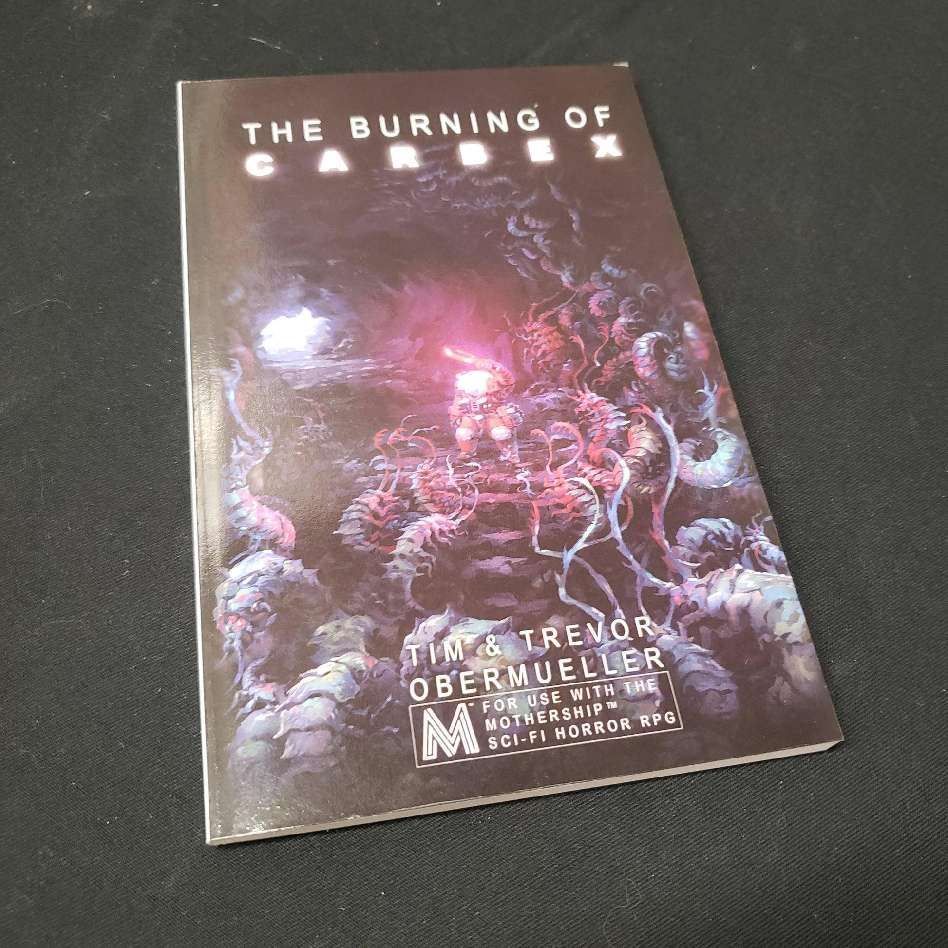 Image shows the front cover of the Burning of Carbex roleplaying game book