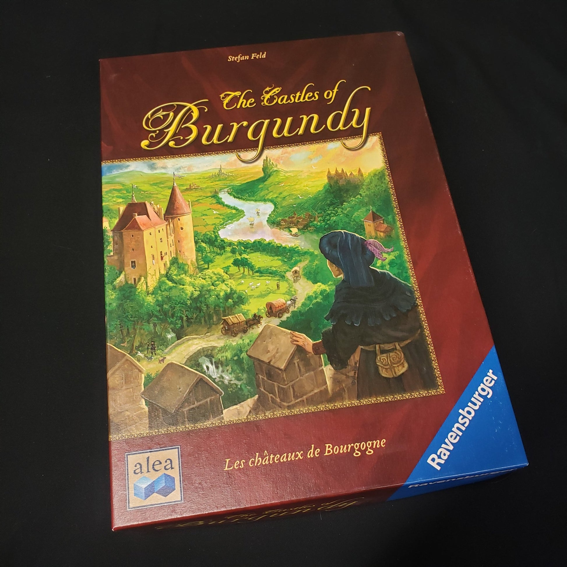 Image shows the front cover of the box of the Castles of Burgundy board game