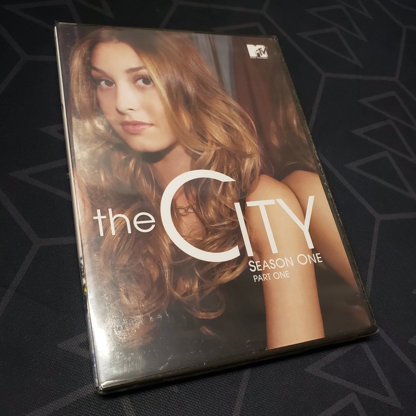 Image shows the front of the case for the first part of the first season of The City on DVD