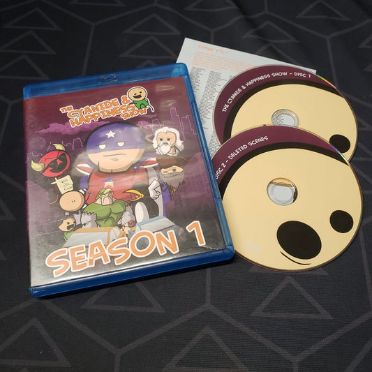 Image shows the case, insert & two discs for the Season 1 set of The Cyanide & Happiness Show on Blu-Ray