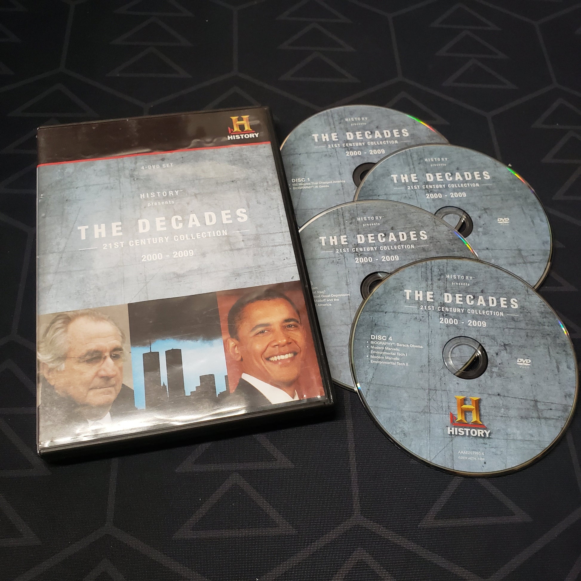 Image shows the case & four discs for the History Channel collection The Decades: 2000-2009 on DVD