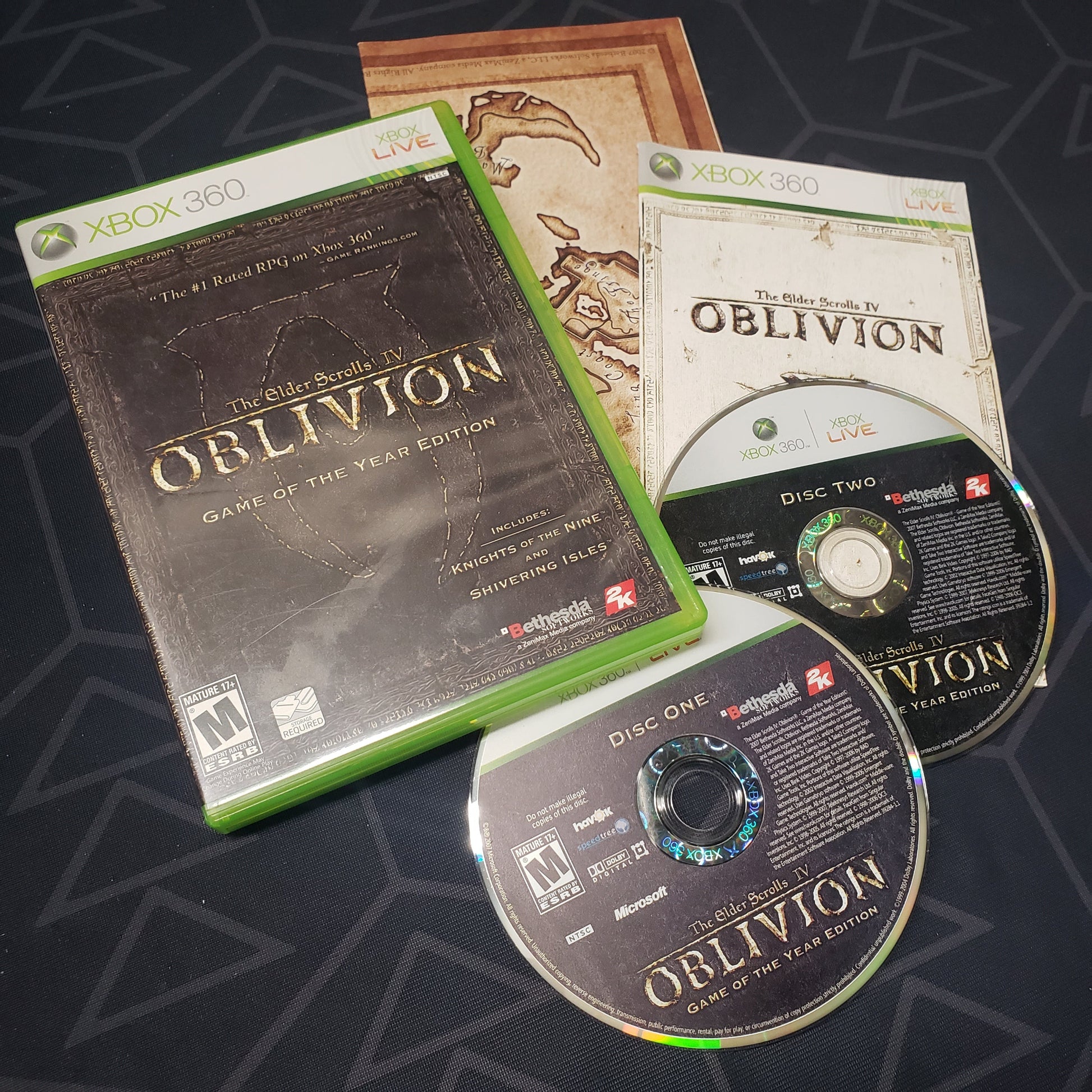 Image shows the case, manual and disc for the Game of the Year Edition for the video game The Elder Scrolls IV: Oblivion for Xbox 360