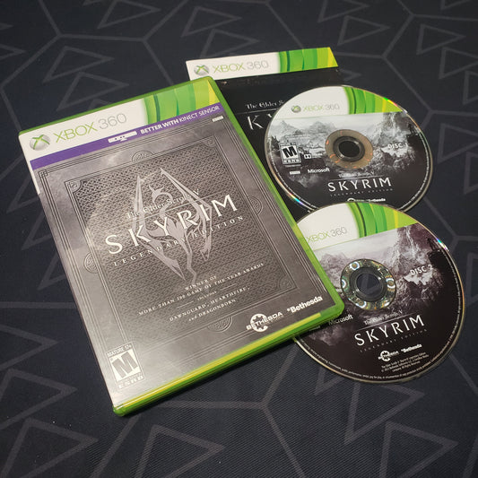 Image shows the case, manual and two discs for the Legendary Edition of the video game The Elder Scrolls V: Skyrim for Xbox 360