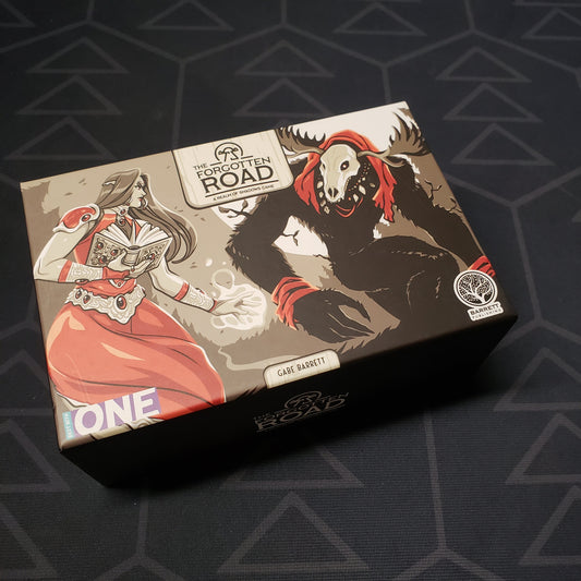Image shows the front cover of the box for the The Forgotten Road board game