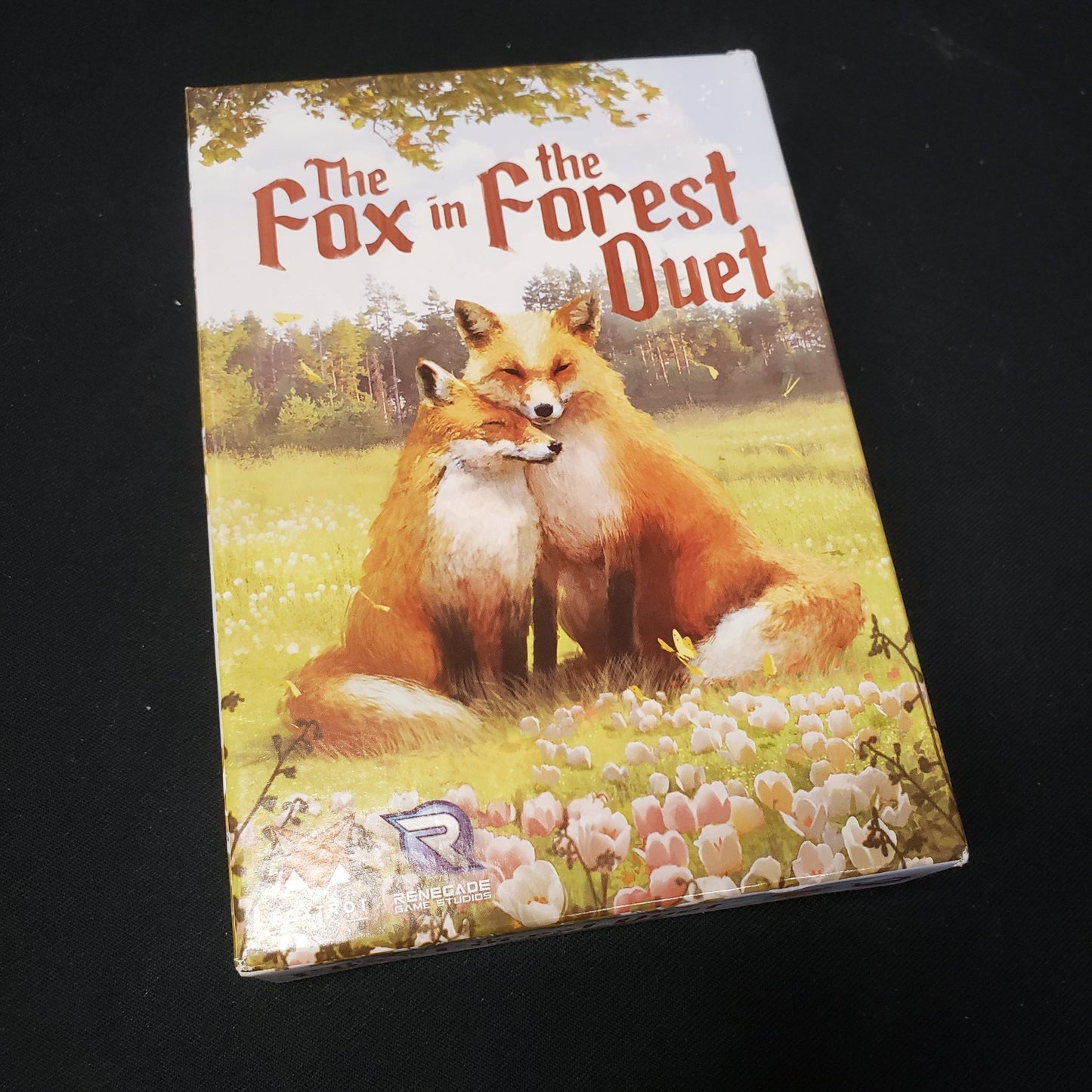 Image shows the front cover of the box of the Fox in the Forest Duet card game