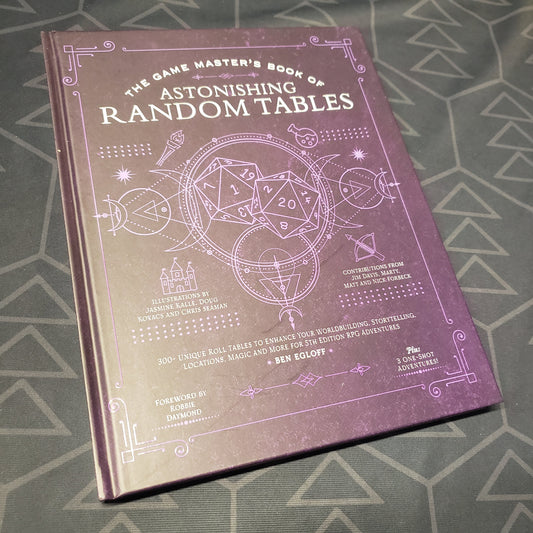 Image shows the front cover of the Game Master's Book of Astonishing Random Tables roleplaying game book