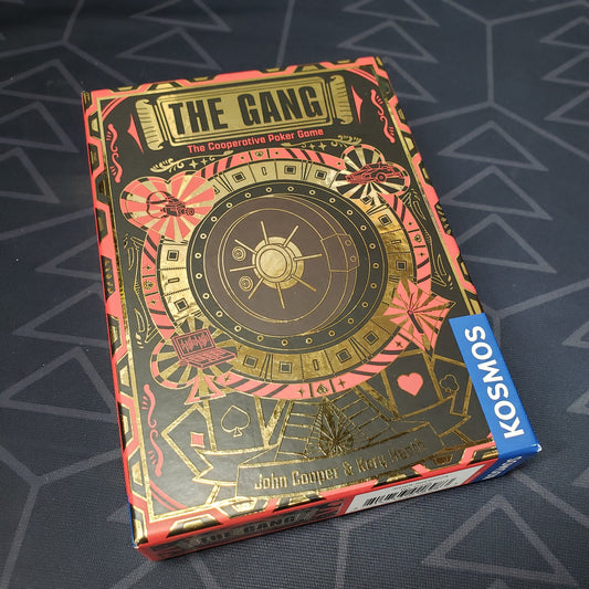 Image shows the front cover of the box of the Gang card game