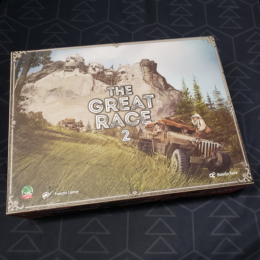 Image shows the front cover of the box for the board game The Great Race 2