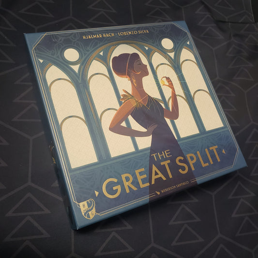 Image shows the front cover of the box for the board game The Great Split