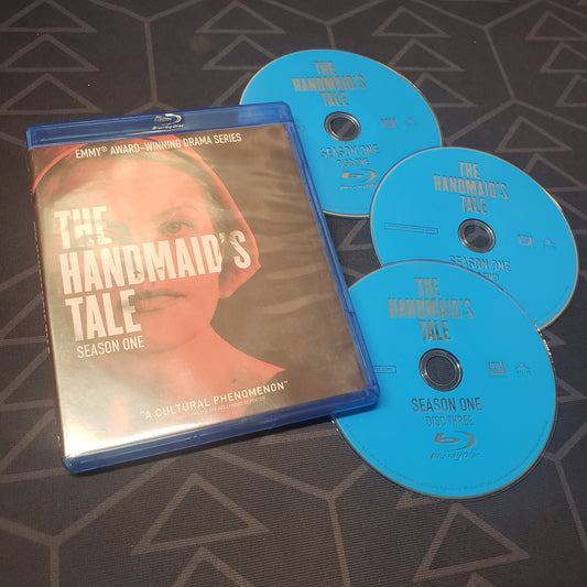 Image shows the case & three discs for the first season of The Handmaid's Tale on Blu-Ray