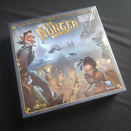 Image shows the front cover of the box of the Hunger board game