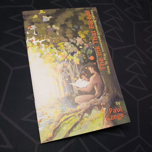 Image shows the front cover of the  roleplaying game book The Ink The Bleeds: How to Play Immersive Journaling Games